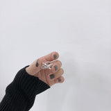 Smooth X-shaped Rings